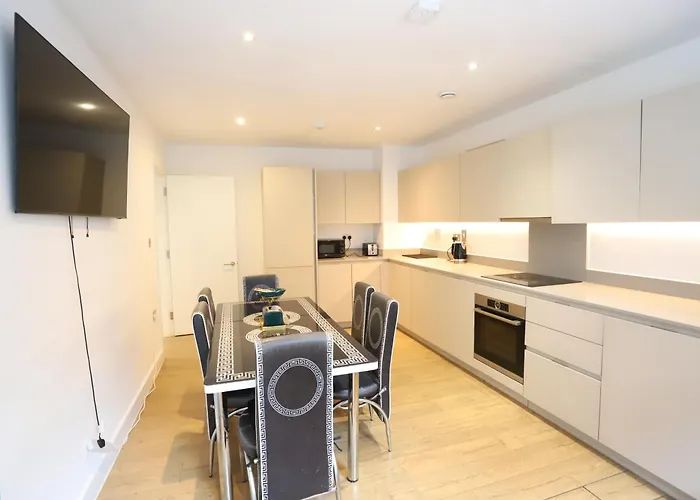 Spacious 3-Story Retreat With Rooftop Terrace And Modern Amenities